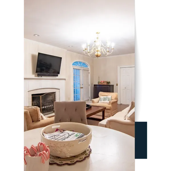 Easley (3) Living room with fireplace, TV, and chandelier, ready for Easley Painting