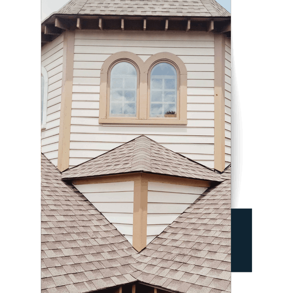 Southedge Painting & Contracting 23 (1) Exterior view of a building with beige siding, a unique roofline, and arched windows.