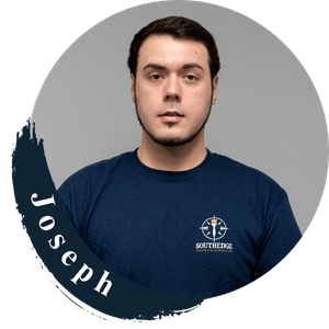 Joseph from SouthEdge, wearing a navy t-shirt with the company logo.