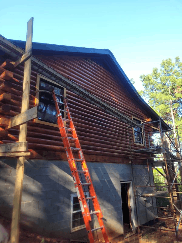 Log Cabin Construction With Ladder And Scaffolding Craftsmanship that exceeds expectations