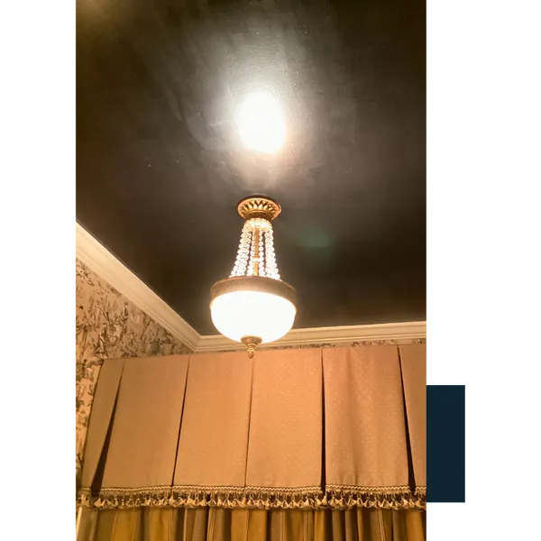 Ornate Chandelier Above Gold Drapes Flexible Service Pricing