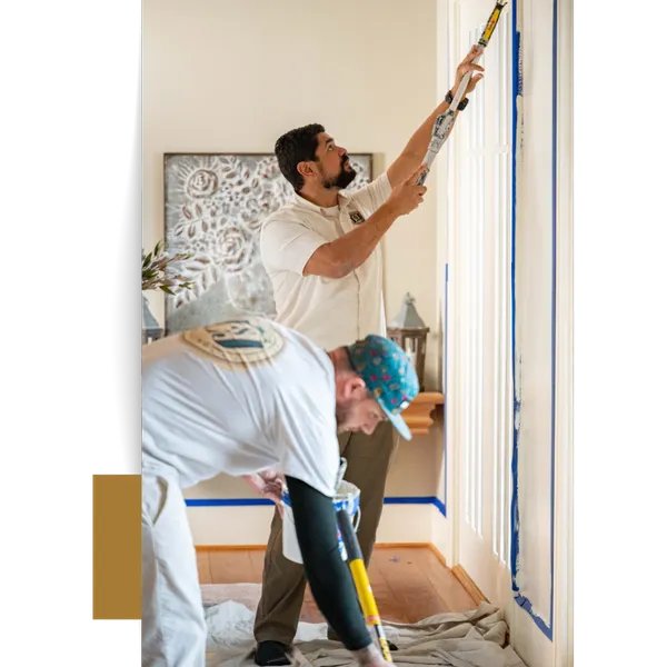 Painters Applying Tape To Door Frame Our Residential & Commercial Painting Services