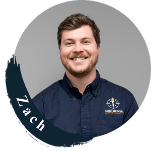 Zach, a smiling man wearing a navy blue shirt with the Southridge logo, featured in the About Us section.